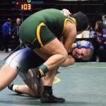 Soldotnas Amanda Wylie grapples with Alaina Pete of Brevig Mission in the girls 160-pound final Saturday, Dec. 21, 2019, at the ASAA State Wrestling Championships at the Alaska Airlines Center in Anchorage, Alaska. (Photo by Joey Klecka/Peninsula Clarion)