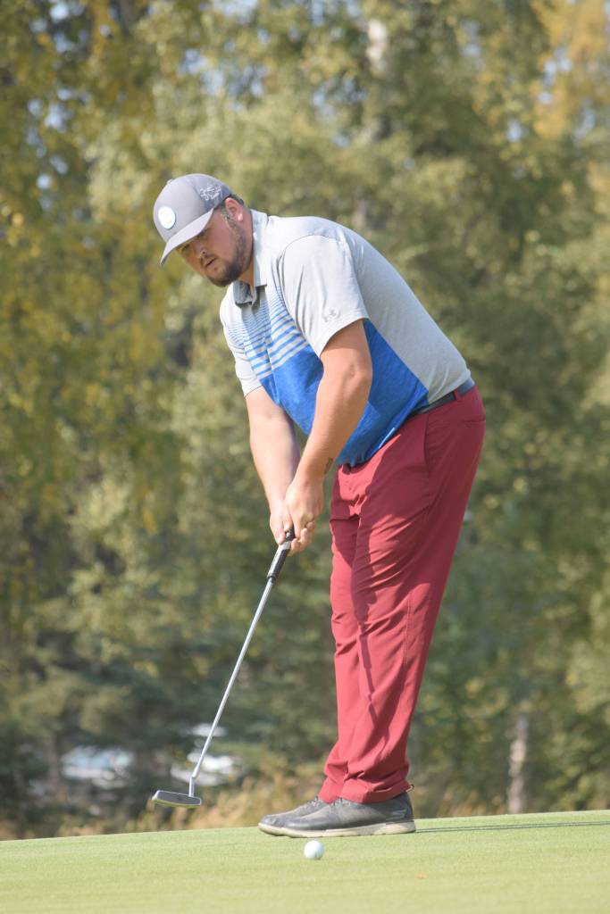 Beau Forrest, an Idaho pro who grew up playing at Birch Ridge Golf Course, putts on No. 11 on Aug. 25 during the Kenai Peninsula Open at Birch Ridge in Soldotna. (Photo by Jeff Helminiak/Peninsula Clarion)