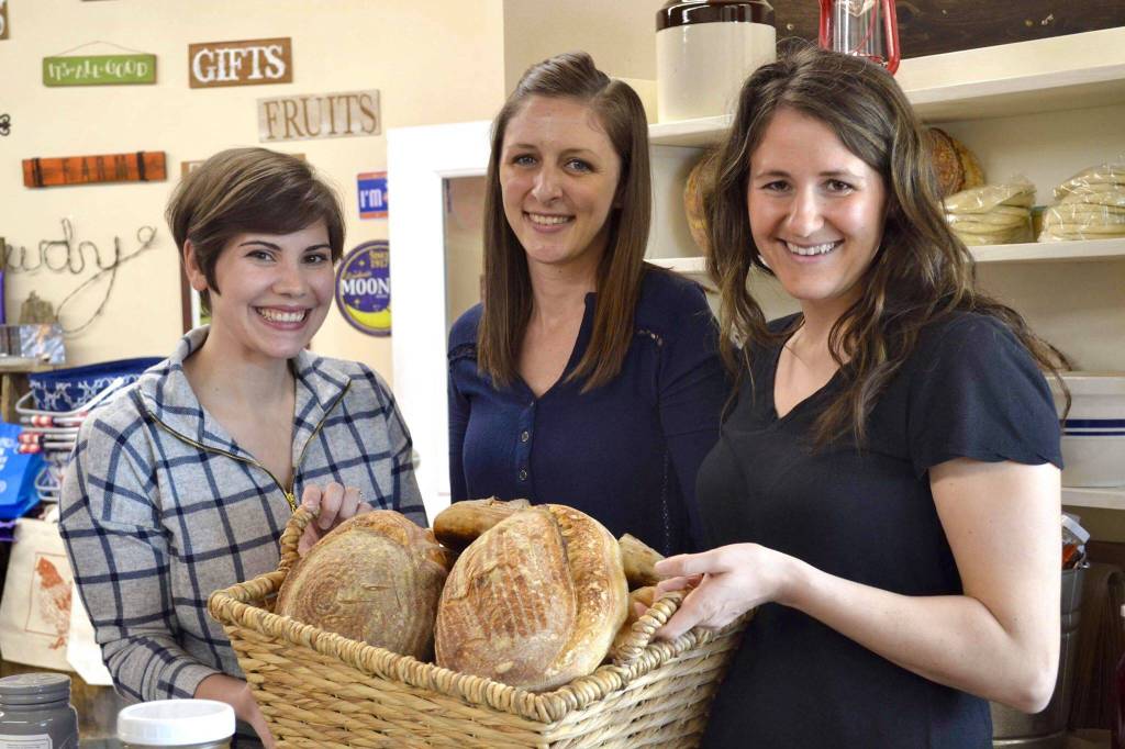 Local sourdough enthusiasts Lacy Ledahl, Maria Nolas and Elizabeth Cox taught a class at Maggies General Store about the benefits and baking opportunities of sourdough, Saturday, April 13, 2019, in Kenai, Alaska. (Photo by Victoria Petersen/Peninsula Clarion)
