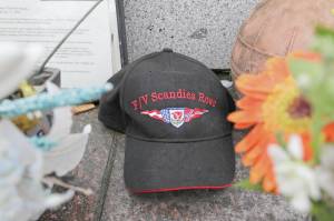 Ted S. Warren / Associated Press                                A ball cap with the name of the crab fishing boat Scandies Rose rests at the Seattle Fishermens Memorial on Thursday in Seattle. The search for five crew members of the Scandies Rose in Alaska has been suspended, the U.S. Coast Guard said after two other crew members of the vessel were rescued after the 130-foot crab fishing boat from Dutch Harbor sank on New Years Eve.