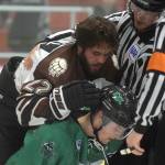 Kenai River Brown Bears defenseman Connor Scahill is involved in a brief scuffle with Jordan Gonzalez of the Chippewa (Wisconsin) Steel on Oct. 5, 2018, at the Soldotna Regional Sports Complex. (Photo by Jeff Helminiak/Peninsula Clarion)