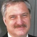Gary Thomas in a January 2002 photo after he was promoted to Homer News editor and publisher. (Homer News file photo)