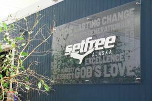 A sign for Set Free Alaska hangs in the faith-based addiction treatment nonprofits new outpatient servies location on Ocean Drive on Monday, Jan. 16, 2020 in Homer, Alaska. The organization held an open house to celebrate the outpatient services building opening. (Photo by Megan Pacer/Homer News)