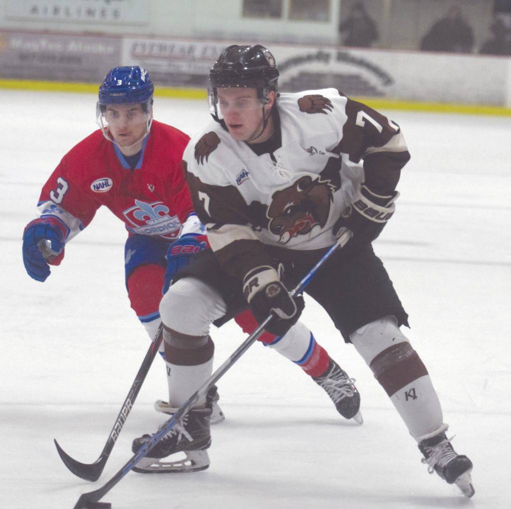 Kenai River Brown Bears forward Logan Ritchie steps inside of Maine Nordiques defenseman Derek Hessinger on Friday, Jan. 18, 2020, at the Soldotna Regional Sports Complex in Soldotna, Alaska. (Photo by Jeff Helminiak/Peninsula Clarion)