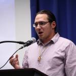 Joel Isaak, Kenaitze Tribe Member and adjunct professor at Kenai Peninsula College, speaks during a Celebration of Life for Dr. Alan Boraas at Kenai Peninsula College on Jan. 17, 2020. (Photo by Brian Mazurek/Peninsula Clarion)