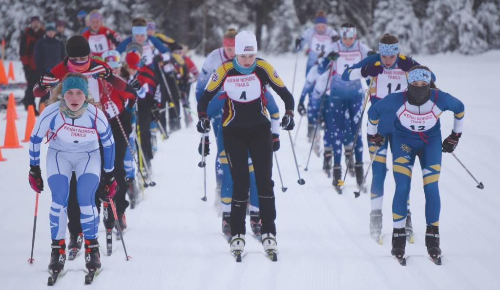 Palmers Zoe Copp, Grace Christians Anna McLaughlin and Homers Autumn Daigle lead the pack at the start of the Kenai Klassic on Friday, Jan. 24, 2020, at Kenai Golf Course in Kenai, Alaska. (Photo by Jeff Helminiak/Peninsula Clarion)