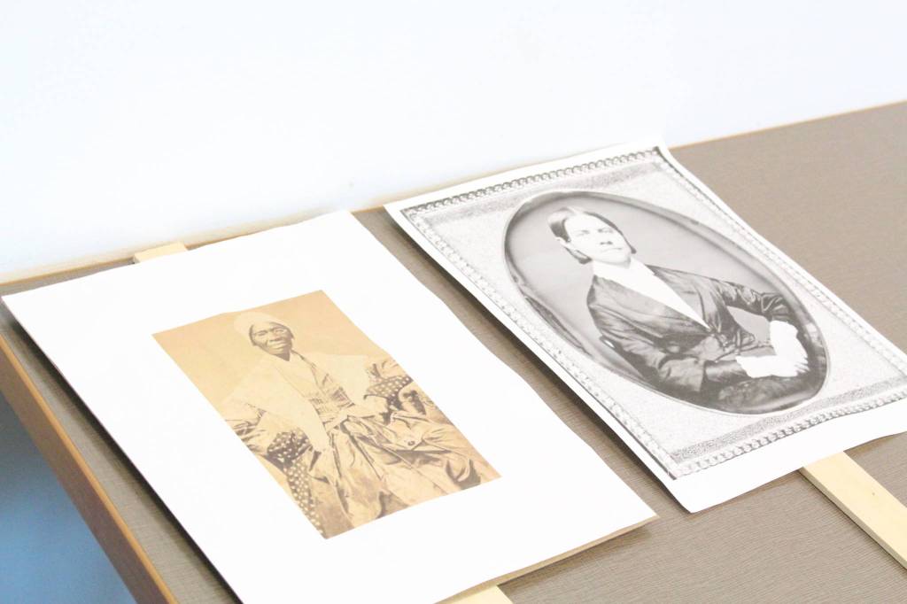 Signs with portraits of Sojourner Truth, left, and Susan B. Anthony, right, are seen here during the Centennial Voices event at the Soldotna Public Library in Soldotna, Alaska, on Saturday, Jan. 25, 2020. (Photo by Brian Mazurek/Peninsula Clarion)