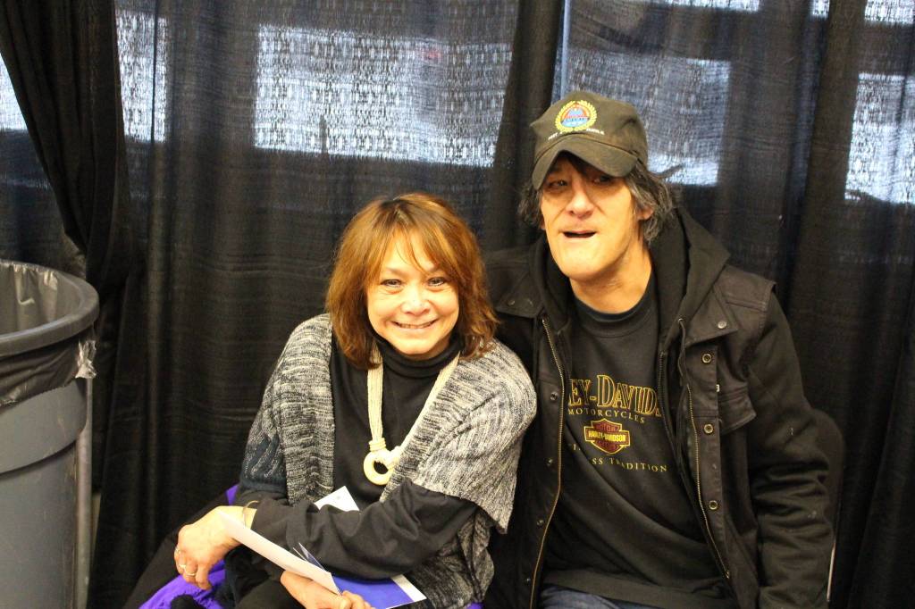 Sandra Groller, left, and JD attend the 2020 Project Homeless Connect event at the Soldotna Regional Sports Complex in Soldotna, Alaska, on Jan. 29, 2020. (Photo by Brian Mazurek/Peninsula Clarion)