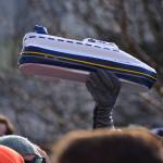 Someone holds up an inflatable Alaska Marine Highway ferry at at a rally to support of the Alaska Marine Highway System on Tuesday, Feb. 11, 2020. (Peter Segall | Juneau Empire)