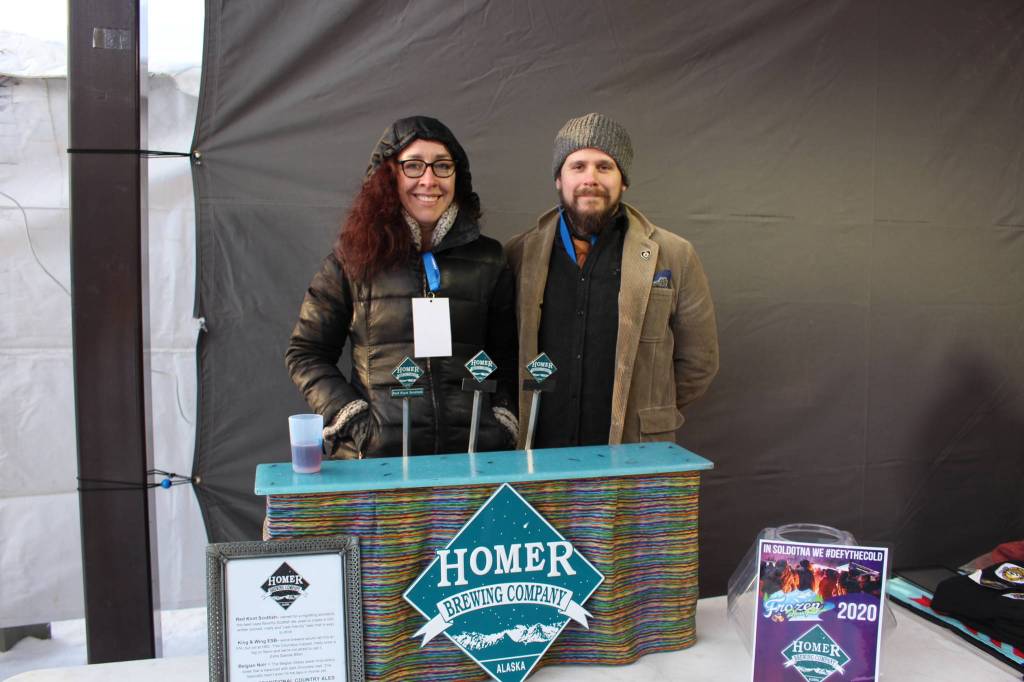 Tara Findley and Randall Pine from Homer Brewing Company smile for the camera during the 2020 Frozen RiverFest at Soldotna Creek Park in Soldotna, Alaska, on Feb. 15, 2020. (Photo by Brian Mazurek/Peninsula Clarion)