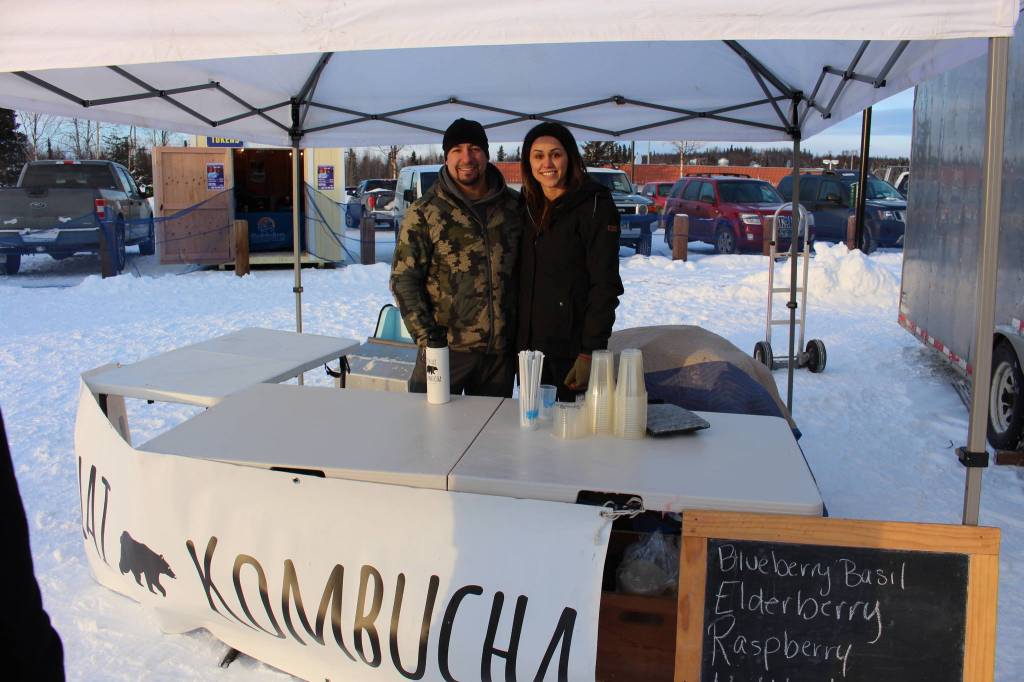 Brian and Devon Gonzalez, owners of Kenai Kombucha, smile for the camera during the 2020 Frozen RiverFest at Soldotna Creek Park in Soldotna, Alaska, on Feb. 15, 2020. (Photo by Brian Mazurek/Peninsula Clarion)                                Brian and Devon Gonzalez, owners of Kenai Kombucha, smile for the camera during the 2020 Frozen RiverFest at Soldotna Creek Park in Soldotna, Alaska on Feb. 15, 2020. (Photo by Brian Mazurek/Peninsula Clarion)