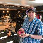 Ethan Satterwhite showcases a clay mask he created in an art class at Hope Community Resources Feb. 18, 2020, in Soldotna, Alaska. (Photo by Victoria Petersen/Peninsula Clarion)