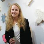 Tamara Wilson poses for a photo at at the First Friday opening of her show, Macaroni and Cheese.