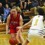 Kenais Jaiden Streiff dribbles past Homers Sailey Rhodes during a Wednesday, Feb. 19, 2020 basketball game at Homer High School in Homer, Alaska. (Photo by Megan Pacer/Homer News)