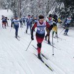 Kenais Gabriella Tews leads Soldotnas Jordan Strausbaugh early in the girls 7.5-kilometer race Friday, Feb. 21, 2020, at the Alaska state Nordic ski championships at Kincaid Park in Anchorage. (Photo by Joey Klecka/For the Clarion)