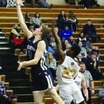 Homers Eyoab Knapp follows Soldotnas Tyler Morrison as he goes up for a basket during a Tuesday, Feb. 25, 2020 basketball game in the Alice Witte Gymnasium in Homer, Alaska. (Photo by Megan Pacer/Homer News)