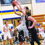 Homers Ethan Anderson goes up for a basket during a Friday, Feb. 28, 2020 basketball game against Nikiski Middle/High School in the Alice Witte Gymnasium in Homer, Alaska. (Photo by Megan Pacer/Homer News)