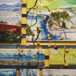 A collection of Deborah Poores paintings at Grace Ridge Brewery on Friday, Feb. 7, 2020, in Homer, Alaska. Its an interesting hanging space there, she said of the display area at the brewery. Youre really presenting those pieces as a collage. You have to squish them together. (Photo by Michael Armstrong/Homer News)