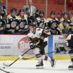 Kenai River Brown Bears defenseman Preston Weeks moves the puck up the ice against the Janesville (Wisconsin) Jets on Friday, Oct. 11, 2019, at the Soldotna Regional Sports Complex in Soldotna, Alaska. (Photo by Jeff Helminiak/Peninsula Clarion)