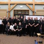 The employees and volunteers of the Nikiski Fire Department smile for a group photo during the Departments 2019 Award Ceremony in the Nikiski Senior Center on Feb. 28, 2020. (Photo by Brian Mazurek/Peninsula Clarion)