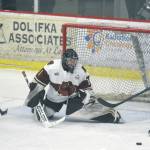 Kenai River goalie Landon Pavlisin defends the net from Amarillo (Texas) Bulls forward Niclas Puikkonen as Kenai Rivers Ryan Reid looks on Friday, March 6, 2020, at the Soldotna Regional Sports Complex in Soldotna, Alaska. (Photo by Jeff Helminiak/Peninsula Clarion)