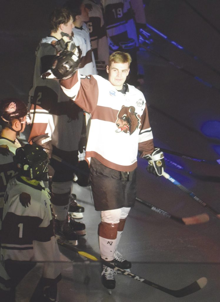 Kenai River Brown Bears Preston Weeks, of Soldotna, acknowledges the crowd as he gets set to set the all-time North American Hockey League record for games played Friday at the Soldotna Regional Sports Complex in Soldotna. (Photo by Jeff Helminiak/Peninsula Clarion)