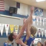 Cook Inlet Academy senior Anna Henderson goes up for a contested shot against Nikolaevsk senior Elizabeth Fefelov on Friday, March 6, 2020, in the Peninsula Conference championship game at Cook Inlet Academy in Soldotna, Alaska. (Photo by Dan Balmer/For the Clarion)