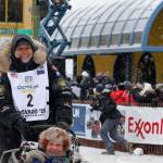 Musher Martin Massicotte of St-Tite, Quebec, Canada, leaves the start line during the ceremonial start of the Iditarod Trail Sled Dog Race Saturday, March 7, 2020, in Anchorage, Alaska. The real race starts March 8 about 50 miles north of Anchorage, with the winner expected in the Bering Sea coastal town of Nome about 10 or 11 days later. (AP Photo/Mark Thiessen)