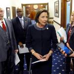 Alaska Senate President Cathy Giessel speaks to reporters after the Senate approved funding for the state to respond to the new coronavirus on Wednesday, March 11, 2020, in Juneau, Alaska. Also pictured, from left, are Sens. Bert Stedman, David Wilson and Natasha von Imhof. (AP Photo/Becky Bohrer)