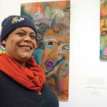 Sadie Mae Millard stands by her art on March 6, 2020, at the Disability Art Show at the Homer Council on the Arts in Homer, Alaska. (Photo by Michael Armstrong/Homer News)