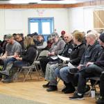 Members of the Ninilchik community wait to hear a presentation by Kenai Peninsula Borough staff during a public hearing Monday, March 9, 2020 at the Kenai Peninsula Fairgrounds in Ninilchik, Alaska. The public hearing was to gather input on whether people in Ninilchik would want to pursue an official borough service area for fire and EMS services. (Photo by Megan Pacer/Homer News)