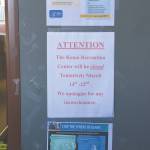 Signs at the Kenai Recreation Center in Kenai, Alaska, announce the closure of the building. Public buildings are being closed to slow the spread of the new coronavirus. (Photo by Jeff Helminiak/Peninsula Clarion)