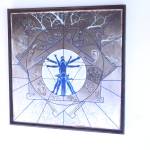 A piece made from acrylic paint, cardboard and reclaimed wood by local artist Charlotte Coots entitled Is this the Blue Print for Us? is seen here on display at the Kenai Fine Art Center in Kenai, Alaska on March 18, 2020. (Photo by Brian Mazurek/Peninsula Clarion)