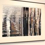 Reflections of Kodiak Harbor, a piece by local photographer Genevieve Klebba, is seen here on display at the Kenai Fine Art Center in Kenai, Alaska on March 18, 2020. (Photo by Brian Mazurek/Peninsula Clarion)