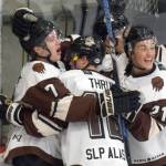 The Kenai River Brown Bears celebrate the first-period goal of Logan Ritchie (far left) on Thursday, Nov. 21, 2019, at the Soldotna Regional Sports Complex in Soldotna, Alaska. (Photo by Jeff Helminiak/Peninsula Clarion)