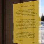 A sign on the door of Kenai Grace Brethren Church indicating that in-person Sunday gatherings have been postponed is seen here in Kenai, Alaska, on March 28, 2020. (Photo by Brian Mazurek/Peninsula Clarion)