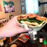 Salmon, greens, an assortment of spices and condiments make a salmon patty wrap. (Photo by Victoria Petersen/Peninsula Clarion)