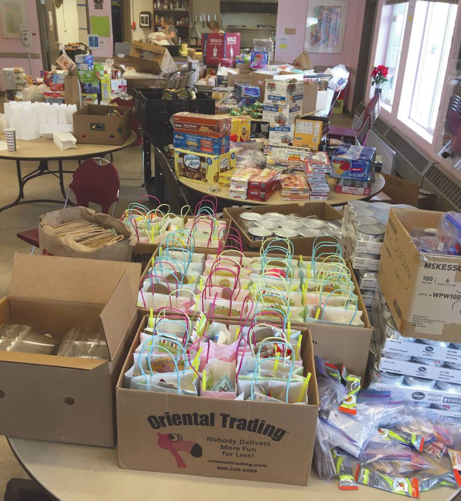 The dining room, seen on Tuesday, March 31, 2020, at the Kenai Peninsula Food Bank in Soldotna, Alaska, is normally used for dine-in meals, but due to the threat of the new coronavirus, the meals are all takeout and the room is used to store food. (Photo by Jeff Helminiak/Peninsula Clarion)