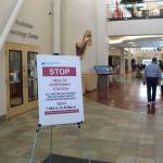 A sign instructing patients and visitors on the current screening process is seen here in the River Tower of Central Peninsula Hospital in Soldotna, Alaska on April 7, 2020. (Photo by Brian Mazurek/Peninsula Clarion)
