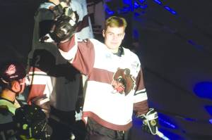 Kenai River Brown Bears Preston Weeks, of Soldotna, acknowledges the crowd as he gets set to set the all-time North American Hockey League record for games played Friday, March 6, 2020, at the Soldotna Regional Sports Complex in Soldotna, Alaska. (Photo by Jeff Helminiak/Peninsula Clarion)