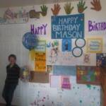 Mason McMilin and the signs his friends and family made for his drive-by birthday in Soldotna, Alaska, on April 10, 2020. (Photo courtesy of Kim McMilin)