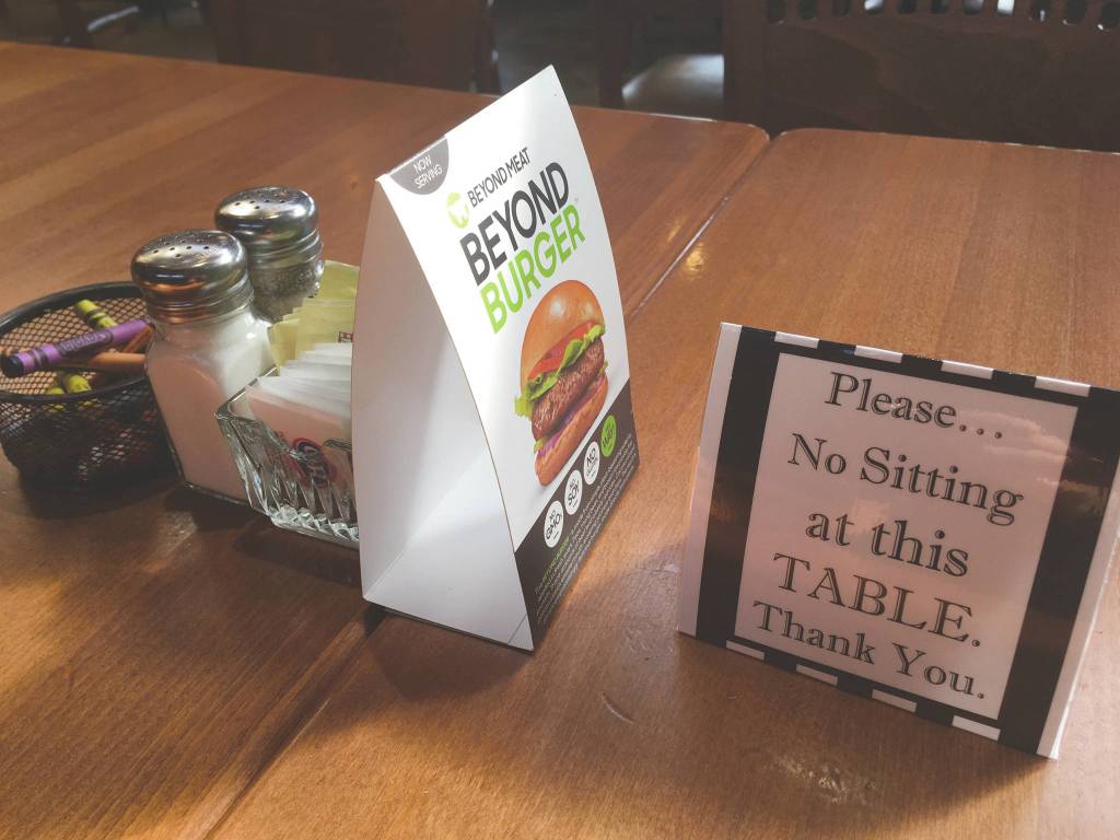 A table at Buckets Sports Grill in Soldotna is not available for dining Thursday, April 30, 2020, due to the threat of the new coronavirus. (Photo by Jeff Helminiak/Peninsula Clarion)