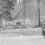 Kay and Kevin Downs approach the green at the first hole at Birch Ridge Golf Course on Saturday. Instead of putting the ball in the hole, golfers must hit the yellow noodle instead. (Photo by Jeff Helminiak/Peninsula Clarion)