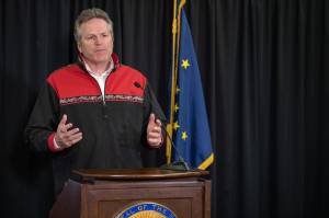 Courtesy photo | Office of Gov. Mike Dunleavy                                Gov. Mike Dunleavy at a press conference in Anchorage on Monday, May 11, 2020. Dunleavy had hoped to send out federal funds using a limited legal process, saying expediency was key. But a Juneau mans lawsuit is calling lawmakers back to the Capitol.
