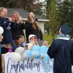 Friends and family of Galen Brantley III cheer him on as he graduates from Soldotna High School on May 18, 2020. (Photo by Brian Mazurek/Peninsula Clarion)
