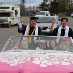 Nikiski High School seniors Hamilton Hammie Cox, left, and Martin Cox III, right, smile for the camera during the 2020 Nikiski High School Graduation Commencement Ceremony in Nikiski, Alaska on May 19, 2020. (Photo by Brian Mazurek/Peninsula Clarion)