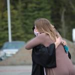 Class valedictorian America Jeffreys hugs her mom after giving a speech during the 2020 Nikiski High School Graduation Commencement Ceremony in Nikiski, Alaska on May 19, 2020. (Photo by Brian Mazurek/Peninsula Clarion)