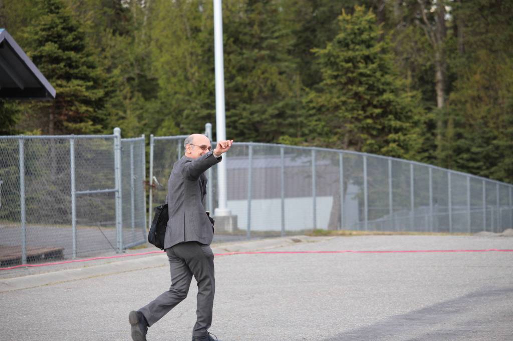 Retiring teacher Joe Rizzo walks off the stage after giving the commencement speech during the 2020 Nikiski High School Graduation Commencement Ceremony in Nikiski, Alaska on May 19, 2020. (Photo by Brian Mazurek/Peninsula Clarion)