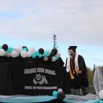 Senior Hamilton Hammie Cox walks onstage to receive his diploma during the 2020 Nikiski High School Graduation Commencement Ceremony in Nikiski, Alaska on May 19, 2020. (Photo by Brian Mazurek/Peninsula Clarion)