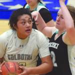 Soldotnas Ituau Tuisaula powers up against Nikiskis Kaycee Bostic on Tuesday, Jan. 21, 2020, at Soldotna High School in Soldotna, Alaska. (Photo by Jeff Helminiak/Peninsula Clarion)